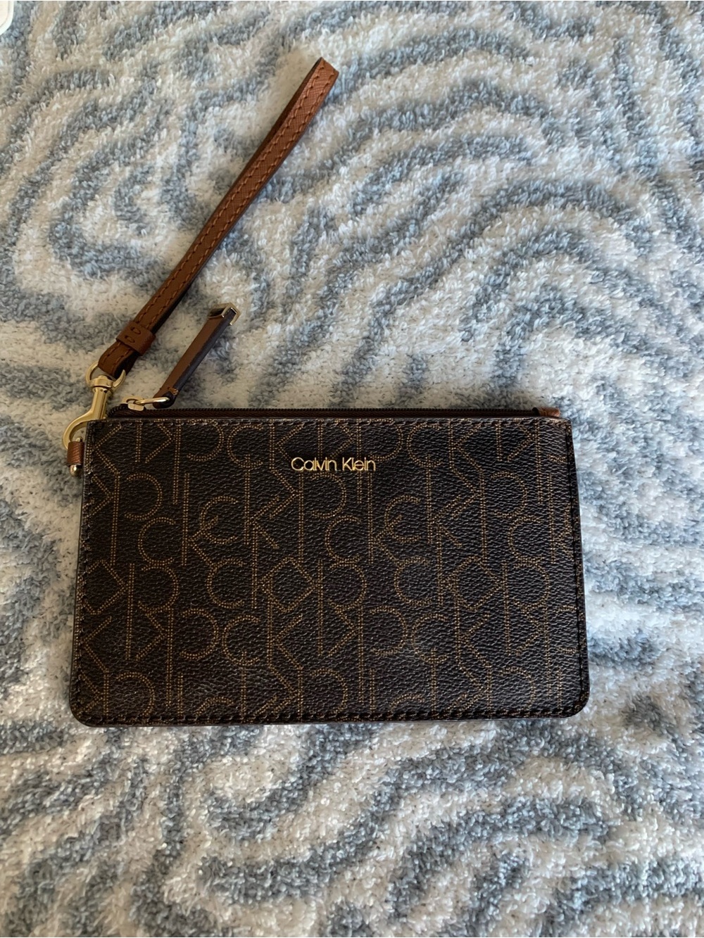 Calvin Klein Dark Brown Monogram Wristlet with Gold Logo